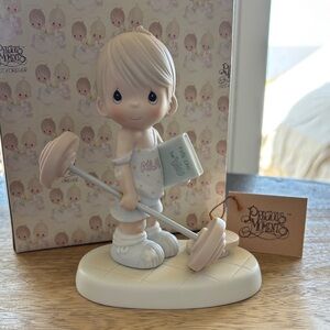 Precious Moments “Believe The Impossible” Porcelain Figurine